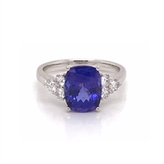 Cushion Cut Oval Tanzanite Dress Ring With Trefoil Diamond Set Shoulders