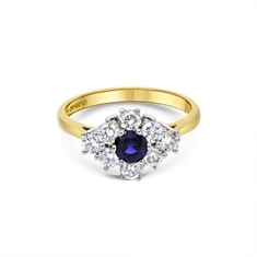 Round Sapphire & Brilliant Cut Diamond Cluster Ring
