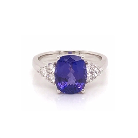Oval Tanzanite Dress Ring With Trefoil Diamond Shoulders