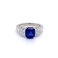 Sapphire Cushion Cut Engagement Ring With Princess Cut Diamond Shoulders