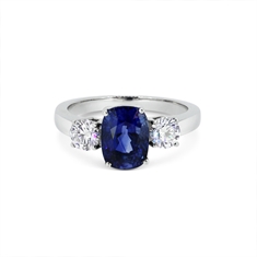 Oval Sapphire & Brilliant Cut Diamond Three Stone Ring