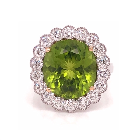 Oval Peridot & Brilliant Cut Diamond Cluster Ring With Migraine Detailing