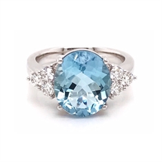 Oval Aquamarine Dress Ring With Diamond Trefoil Shoulders