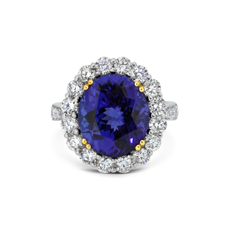 Tanzanite Oval & Brilliant Cut Diamond Cluster Ring With Diamond Set Shoulders