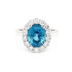 Oval Blue Zircon & Brilliant Cut Diamond Cluster Dress Ring