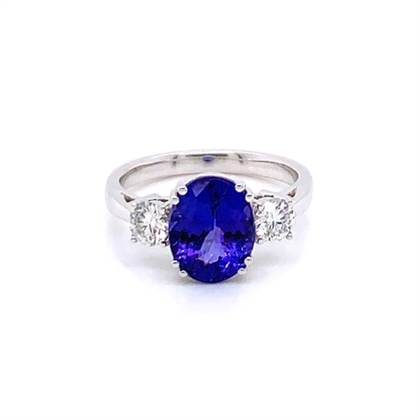 Tanzanite Oval & Diamond Three Stone Claw Set Dress Ring